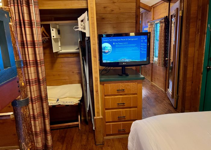 Interior view of a well-furnished cabin at Disney's Fort Wilderness