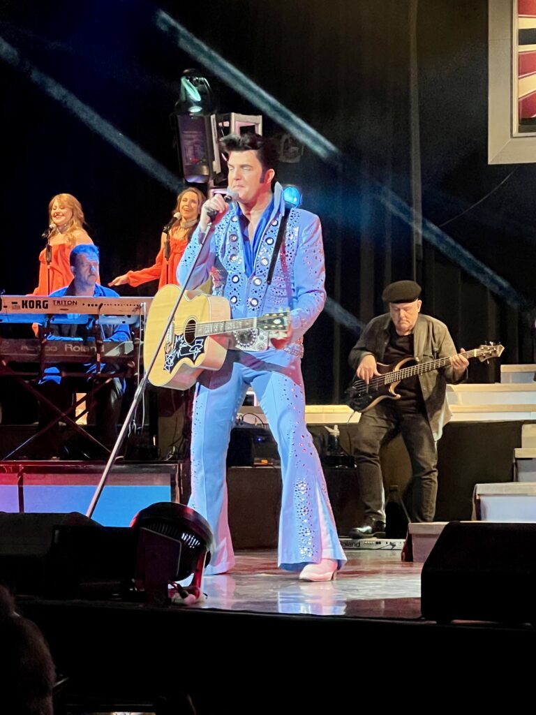 Elvis in his blue jumpsuit on stage at the Legends in Concert Branson, MO.