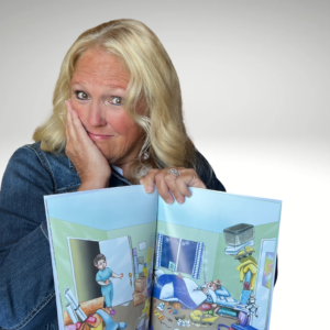 Author Angie Roberts Harris, with her first children's book, Finding Fred, Too Much Treasure!